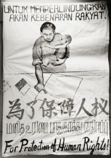 Singaporean human rights poster. A hand-painted banner campaigns for the protection of human rights