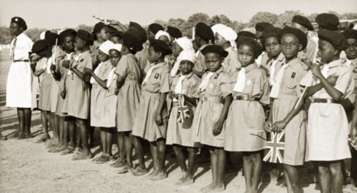 Brownies awaiting the arrival of Queen Elizabeth II. A pack of Nigerian Brownies stand in line