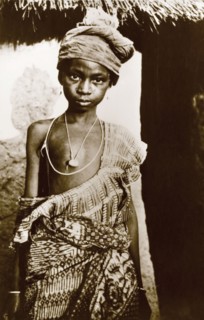 Portrait of a Hausa girl. Portrait of a young Hausa girl wearing traditional patterned robes and a