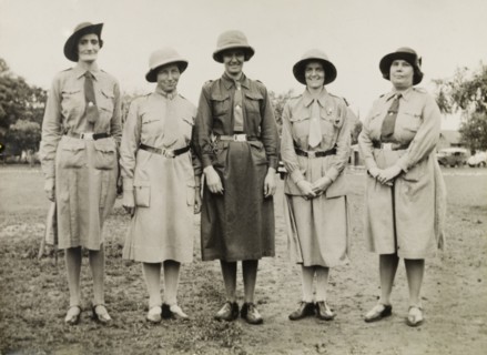 Girl Guide leaders, India. Group portrait of five Girl Guide leaders who pose for the camera