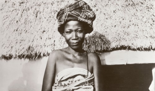 Portrait of a Hausa woman. Head and shoulders portrait of a Hausa woman, dressed in a traditional