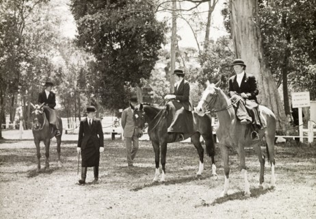 Siddle-saddle' class at Nairobi Show. Three ladies participating in the 'siddle-saddle' class at