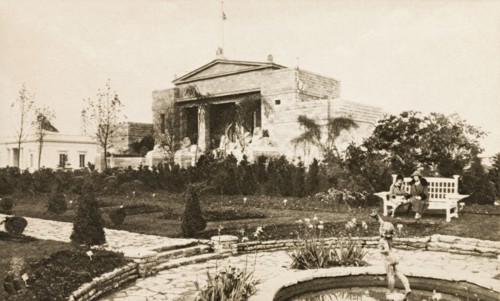 British Empire Exhibition at Wembley. A government building is set in formal gardens at the British