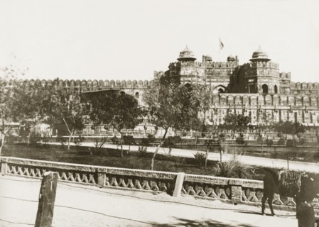 View of Agra Fort. View of Agra Fort, taken from a nearby road bridge. The Delhi Gate projects from