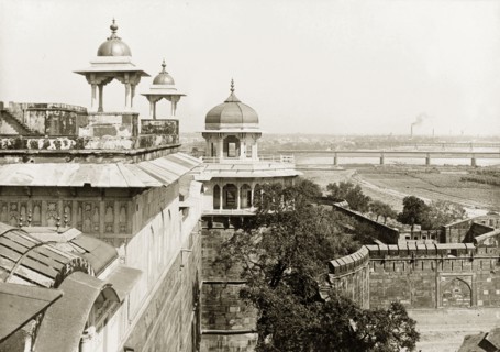 Musamman Burj at Agra Fort. View along the red sandstone wall of Agra Fort looking towards the