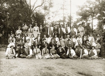 Girl Guides in India. European and Indian Girl Guides and Girl Guide leaders pose for a group