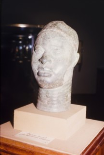 Yoruba bronze sculpture. A bronze sculpture of a head, possibly a royal or religious effigy, from