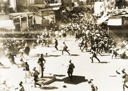Riots in Jaffa, 1936. Rioting crowds of Palestinian Arabs disperse in chaos as British military