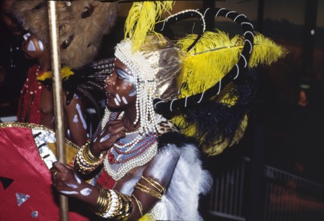 Carnival costume at the Commonwealth Institute. Profile shot of a child wearing elaborate costume
