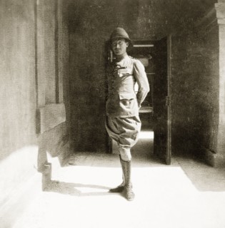 A portrait of Jos Grant. Full-length portrait of Jos Grant, a settler farmer in Kenya and the