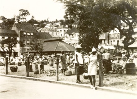 Marketplace in St George. View of a bustling marketplace in St George, where traders set up stalls