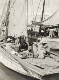 Boats moored at Port au Prince. Sailing boats are moored off shore at Port au Prince. Port au
