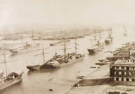 View over the Suez Canal. View over a section of the Suez Canal where numerous ships are moored in