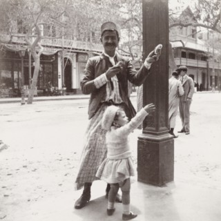 Gully gully man' performing a trick. An Egyptian 'gully gully man' (travelling magician) performs a