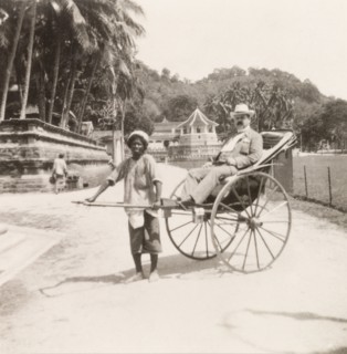 James Murray travelling by rickshaw. James Murray takes a ride in a rickshaw through the streets of