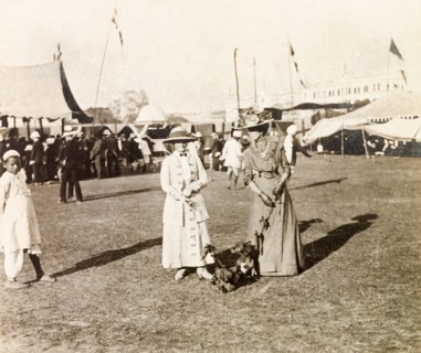 Women attending a dog show, Calcutta. Minnie Murray (left) and a friend, both elegantly dressed and