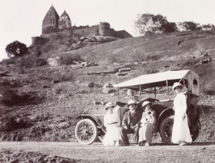 Road trip, India. James and Minnie Murray pose beside their parked motor car with two friends near