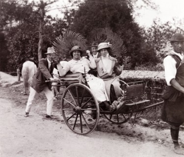 Posing in a rickshaw, Darjeeling. Two British ladies travelling in a rickshaw pose jokingly for the