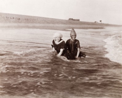Minnie Murray and friend on a Puri beach. Minnie Murray (right) and a friend sit on a sandy beach