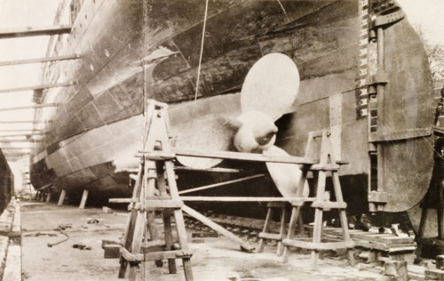 Ship at Kidderpore dry dock. View of a large ship dry-docked at Kidderpore dock, supported by a