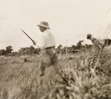 Snipe hunting in paddy fields, Calcutta. James Murray goes snipe hunting with a 'shikari' (hunter)