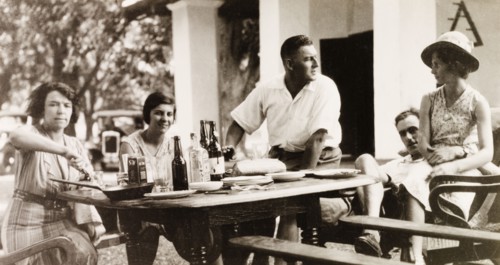 Dining at a dak bungalow, Hazaribagh. A group of friends sit and eat a meal outside a dak bungalow