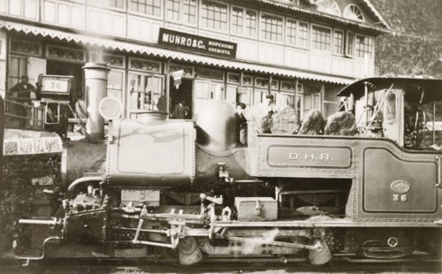 Steam train at Darjeeling station. A steam locomotive stops at Darjeeling station on the Darjeeling