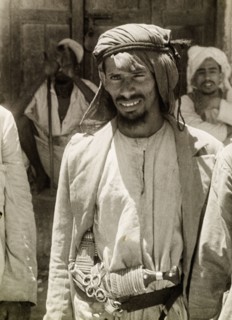 Kanuri dhow captain. Portrait of a Kanuri dhow captain, carrying a large crooked 'jembia' (dagger)