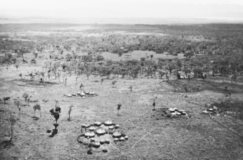 A Luo settlement on the Kano plains. Clusters of huts comprise a Luo settlement on the Kano plains,