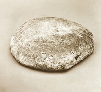 An Indian chapati . Close-up of a chapati, a type of Indian bread eaten as a staple food across the
