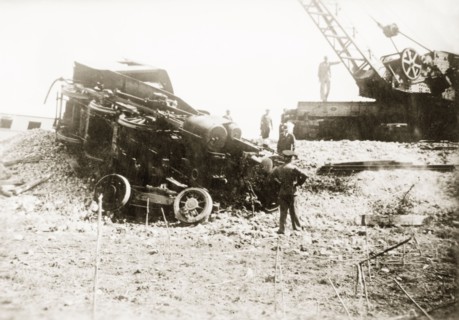 Removing a crashed locomotive, Ras el Ain. Railway officials prepare to lift a derailed steam