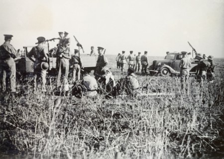 Scene of a railway incident, Lydda. British police and soldiers of the Royal Engineers gather at