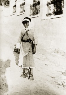 Portrait of a Arab boy, Palestine. An Arab boy in traditional Palestinian dress poses for his