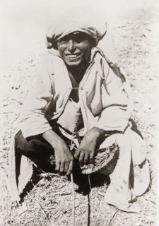 Portrait of a young Arab man, Palestine. Portrait of a young Arab man in traditional dress. British
