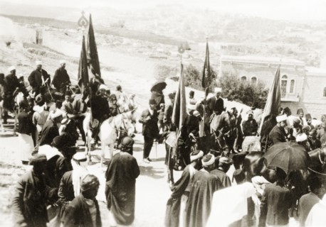 Nebi Musa procession in Ramallah. Muslim pilgrims bearing flags take part in a Nebi Musa
