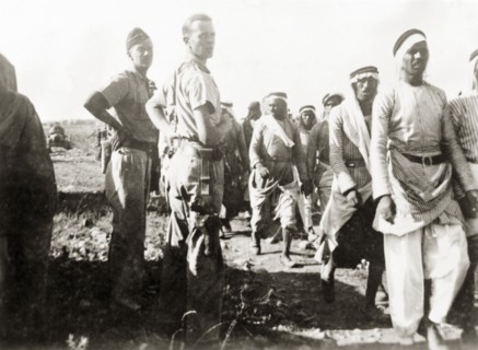 Escorting Arab detainees, Palestine. British soldiers escorts a column of Palestinian Arab men