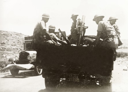 British soldiers with light mortar, Palestine. British soldiers and light mortar are transported to