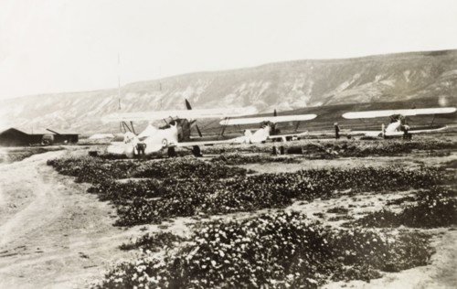 Royal Air Force biplanes, Palestine. Three Royal Air Force biplanes sit in an airfield in northern