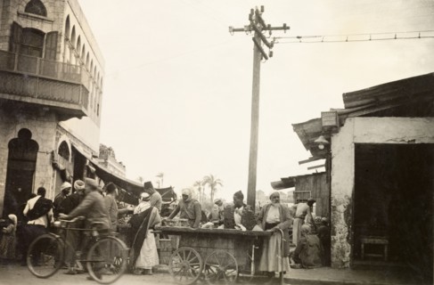 Marketplace in Jaffa. Street traders sell goods from a wheeled cart at a busy marketplace in Jaffa.