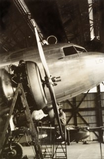 Inspecting a Royal Dutch Airlines aeroplane. Aviation mechanics inspect a KLM Royal Dutch Airlines