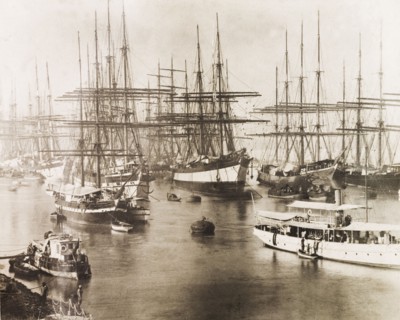 East Indiamen on the Hooghly River. A number of East Indiamen sailing ships are moored on the