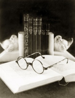 Front cover for a catalogue by 'James Murray & Co.'. Still life study of a pair of spectacles