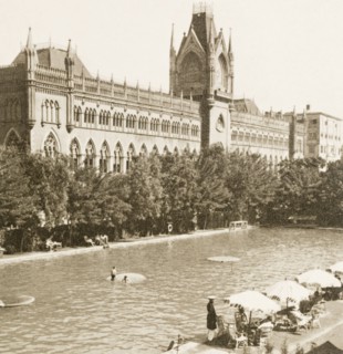 Calcutta Swimming Club, 1938. European bathers relax in and around the pool at Calcutta Swimming