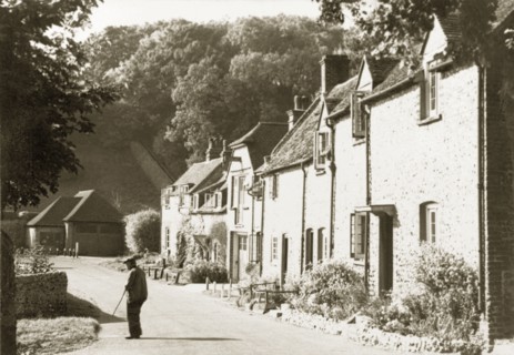 Village of East Dean, Sussex. A row of cottages on a sleepy residential street in East Dean, a