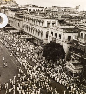 Protest on Old Court House Street, Calcutta, 1946. A crowd of Indian protesters brandish banners as