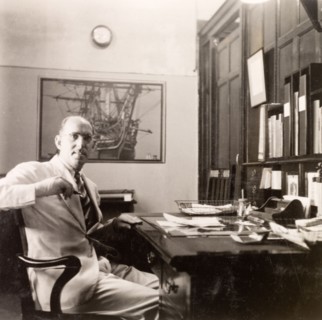 James Murray working in his office, Calcutta. James Murray sits at his desk in the James Murray &