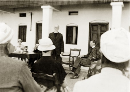 Opening of a new nurse's accommodation. Reverend George Sawday addresses a seated audience during
