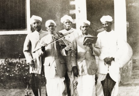 A Methodist evangelist band. Group portrait of a Methodist evangelist band, who sing a song from a