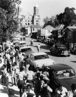Waiting for the carnival to start. Expectant crowds gather on the main street in St John's, waiting