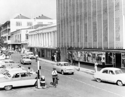 The main street, Bridgetown. Traffic and pedestrians travel along the main street of Bridgetown in